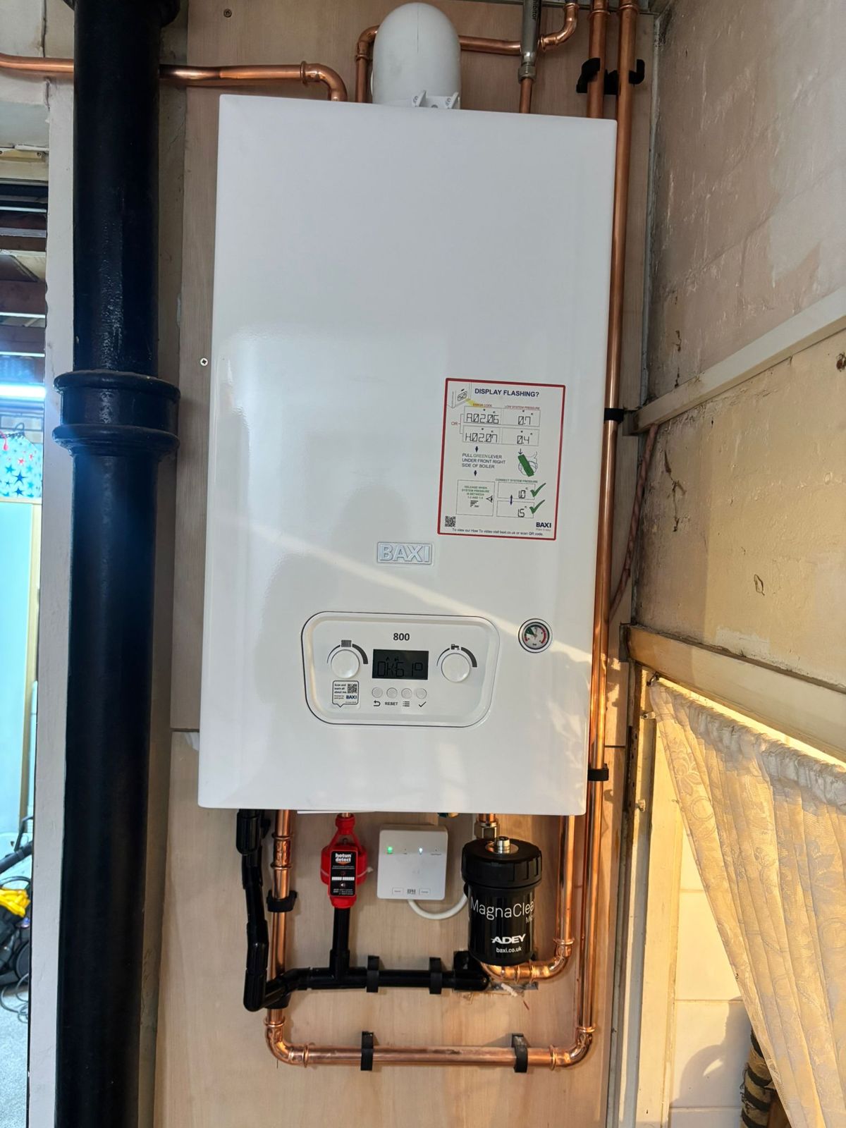 Baxi combi boiler with magnetic filter ready for its annual service in Northampton