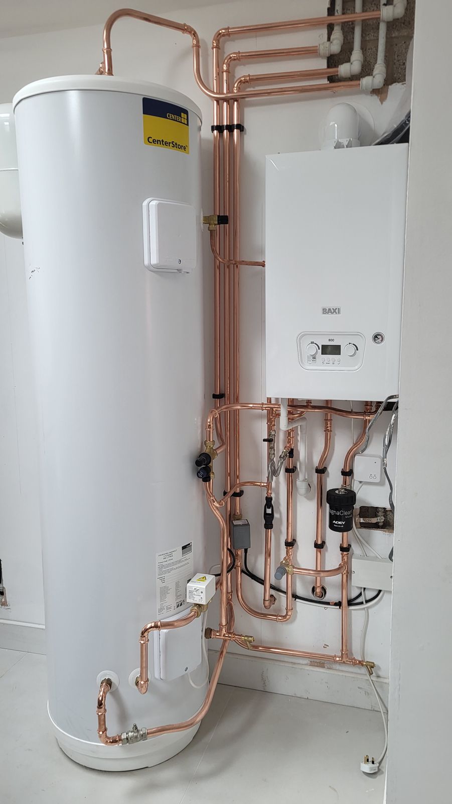 Combi boiler and unvented cylinder with copper pipework installed in Bedford